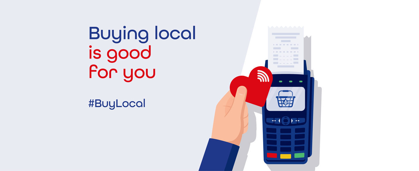 Text Reading 'Buying local is good for you.' Do healthy and smart buying from our Voisin stores.